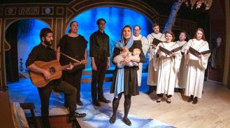 The full cast and choir sing in the Silk Road Rising original production of “Christmas Mubarak” at the Chicago Temple in Chicago. Photo by Airan Wright/Silk Road Rising